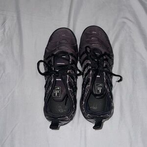 Black and white Nike vapor maxes